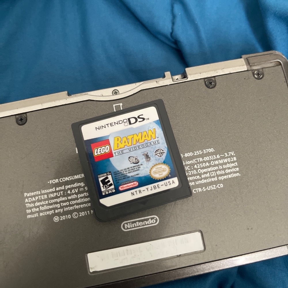 Nintendo 3DS black with charger and a game